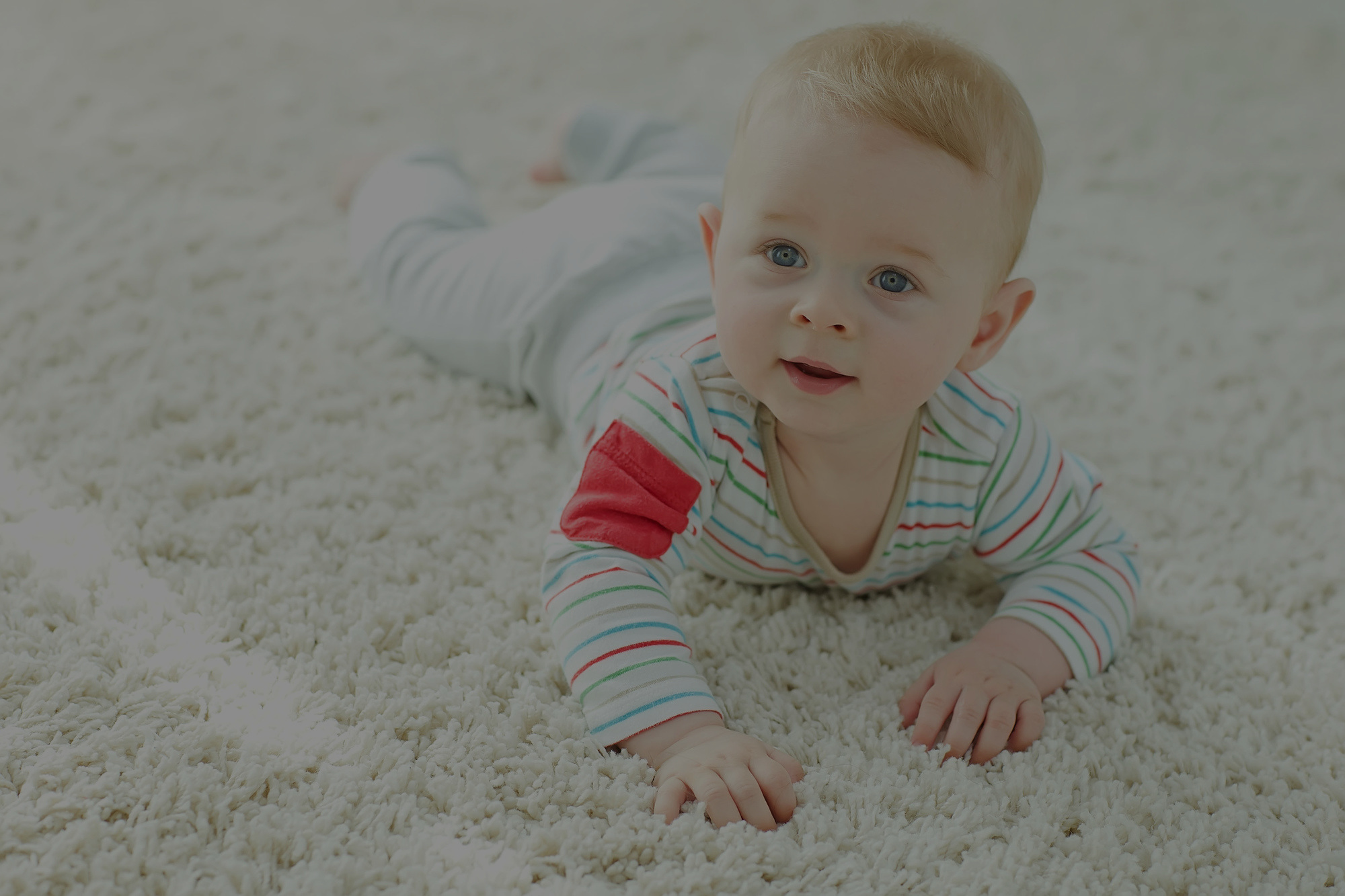 Child on a freshly cleaned carpet